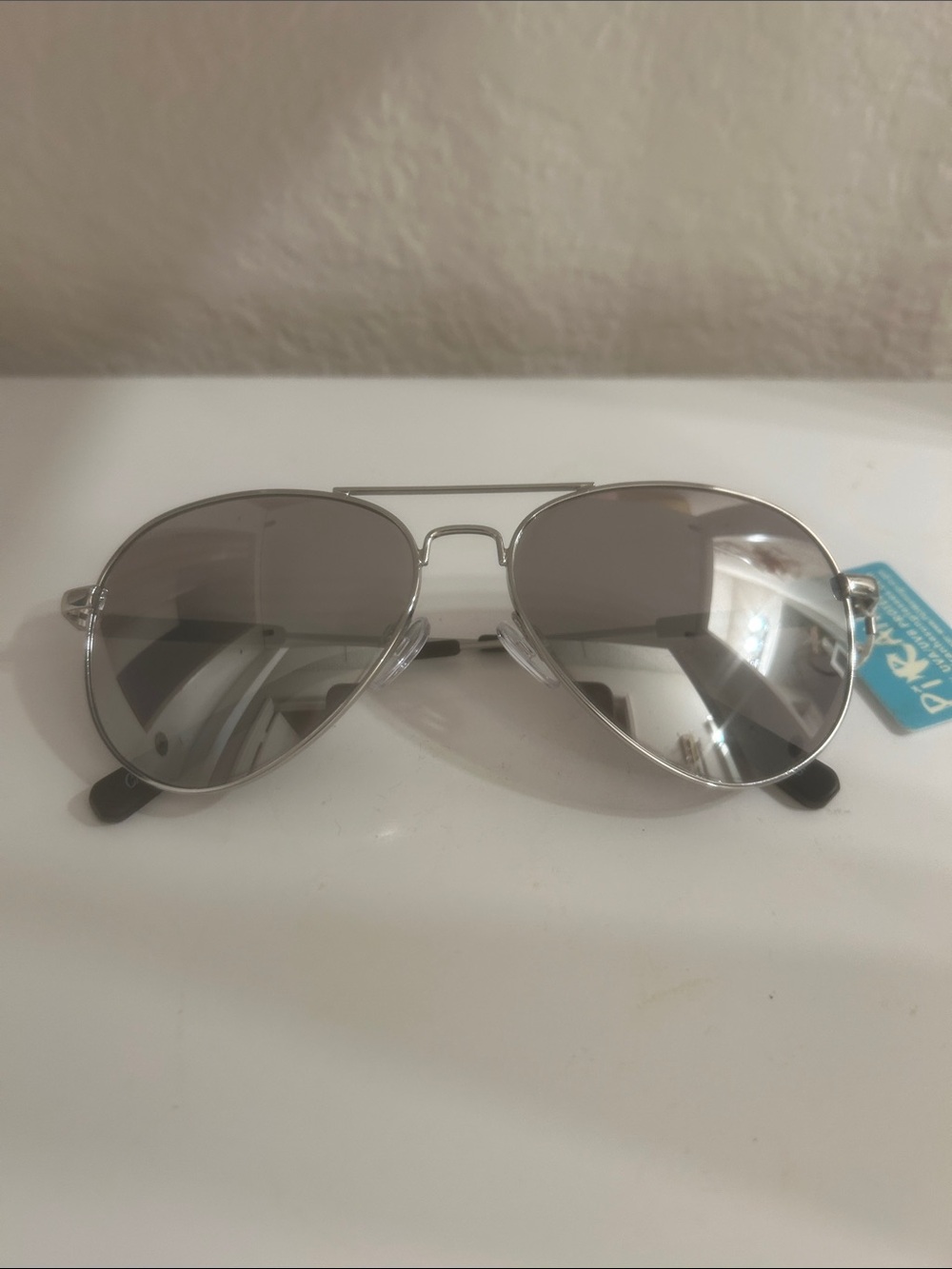 Silver Aviator Sunglasses - Polarized Silver Lenses. 100% UVA/UVB Protection.